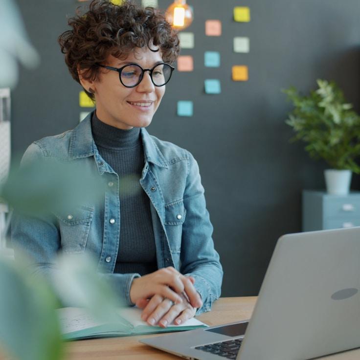 Mobile app project planning workspace with devices and development tools